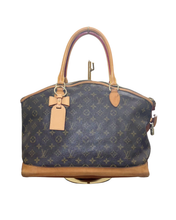 Load image into Gallery viewer, Vachetta Leather Bow Tag Accessory